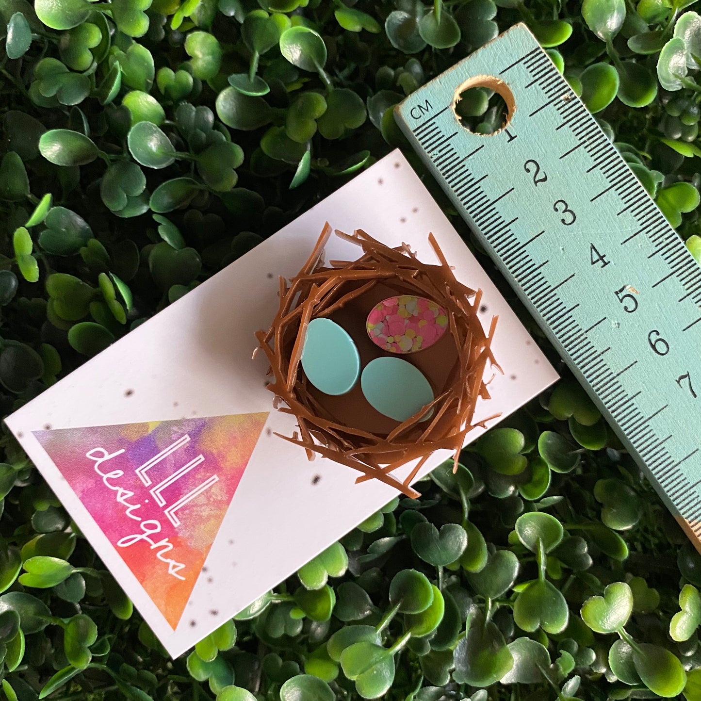 Easter Brooch. Birds Nest Brooch - Featuring 2 Matte Pastel Mint and 1 Colourful Speckled Eggs, set in a nest made of 3 layers of intricately cut acrylic.