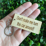 "Don't make me turn this car around!" Quirky Timber Keyring - Laser Cut & Etched on Timber with Silvertone Hardware finished with a LLL Logo Tag.