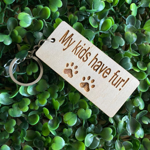 "My kids have fur!" Quirky Timber Keyring - Laser Cut & Etched on Timber with Silvertone Hardware finished with a LLL Logo Tag.