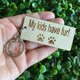 "My kids have fur!" Quirky Timber Keyring - Laser Cut & Etched on Timber with Silvertone Hardware finished with a LLL Logo Tag.