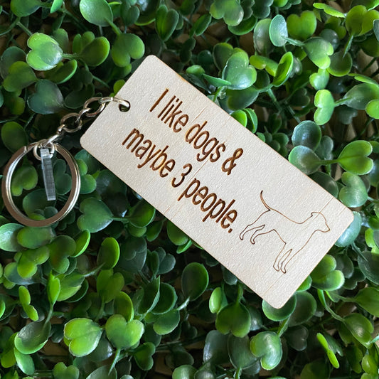 "I like dogs & maybe 3 people" Quirky Timber Keyring - Laser Cut & Etched on Timber with Silvertone Hardware finished with a LLL Logo Tag.