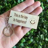 "This is the key to happiness! :)" Quirky Timber Keyring - Laser Cut & Etched on Timber with Silvertone Hardware finished with a LLL Logo Tag.