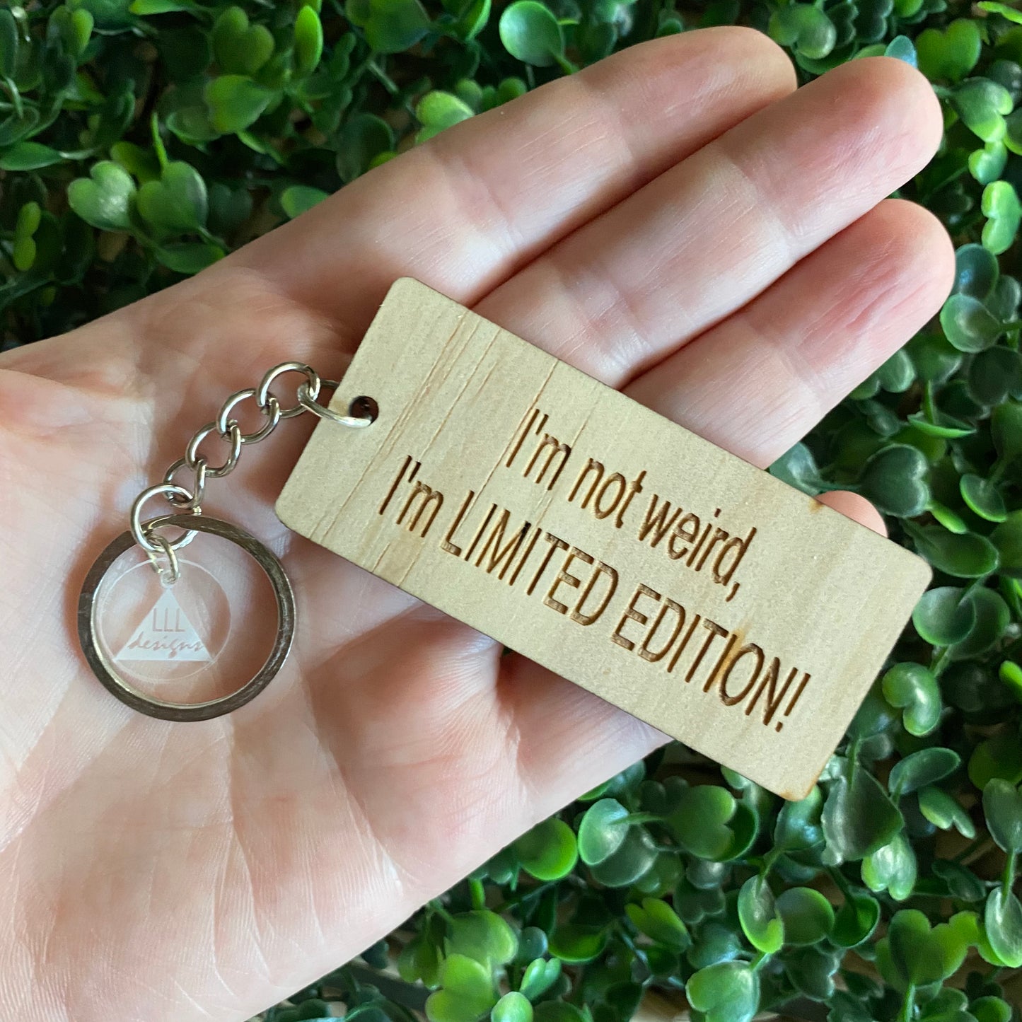 "I'm not weird, I'm LIMITED EDITION!" Quirky Timber Keyring - Laser Cut & Etched on Timber with Silvertone Hardware finished with a LLL Logo Tag.