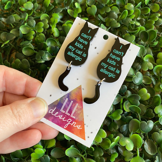 "I can't have kids - my cat is allergic" Sitting Kitty Earrings - Featuring Dangling Tails.