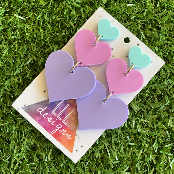 Pretty in Pastel Love Heart Trio Dangle Statement Earrings. These Babes are Perfection in Pastel! Featuring 3 Fabulous shades of Matte Pastel Acrylic.