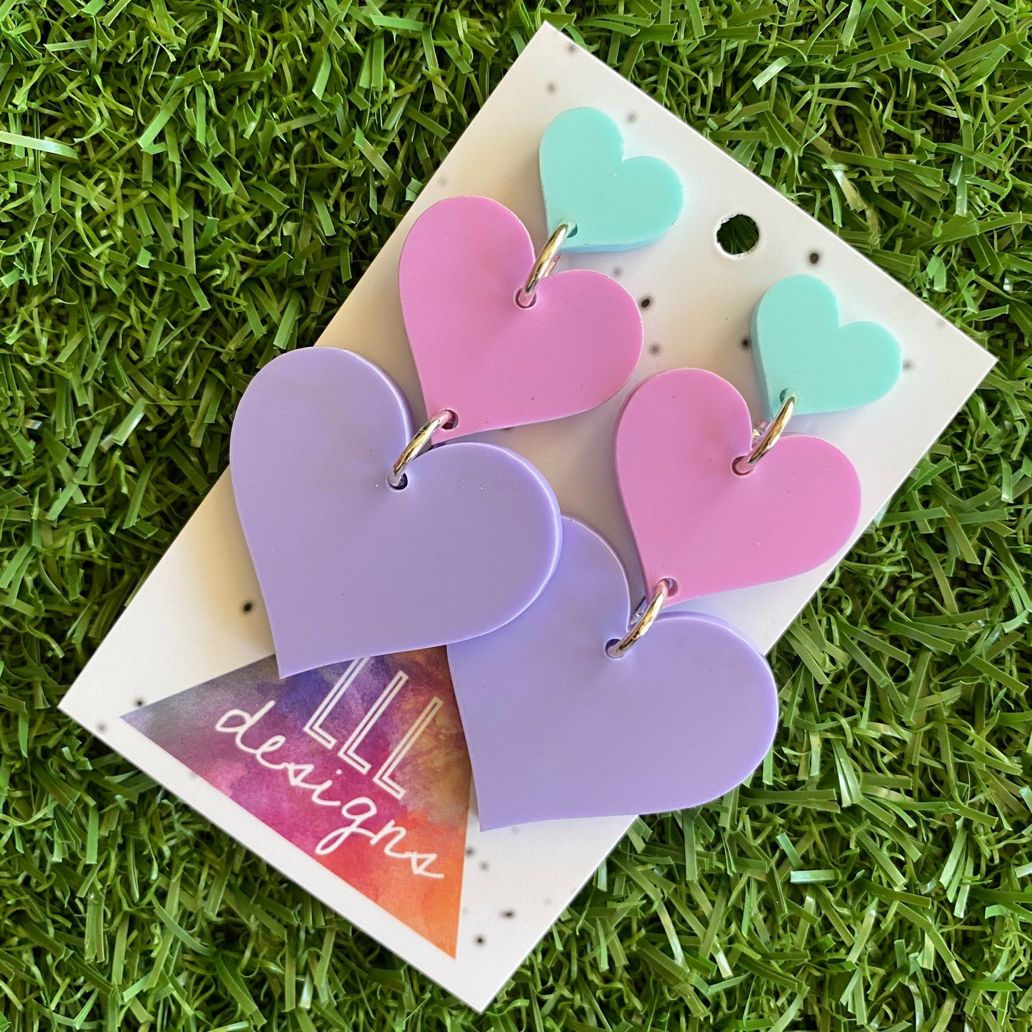 Pretty in Pastel Love Heart Trio Dangle Statement Earrings. These Babes are Perfection in Pastel! Featuring 3 Fabulous shades of Matte Pastel Acrylic.