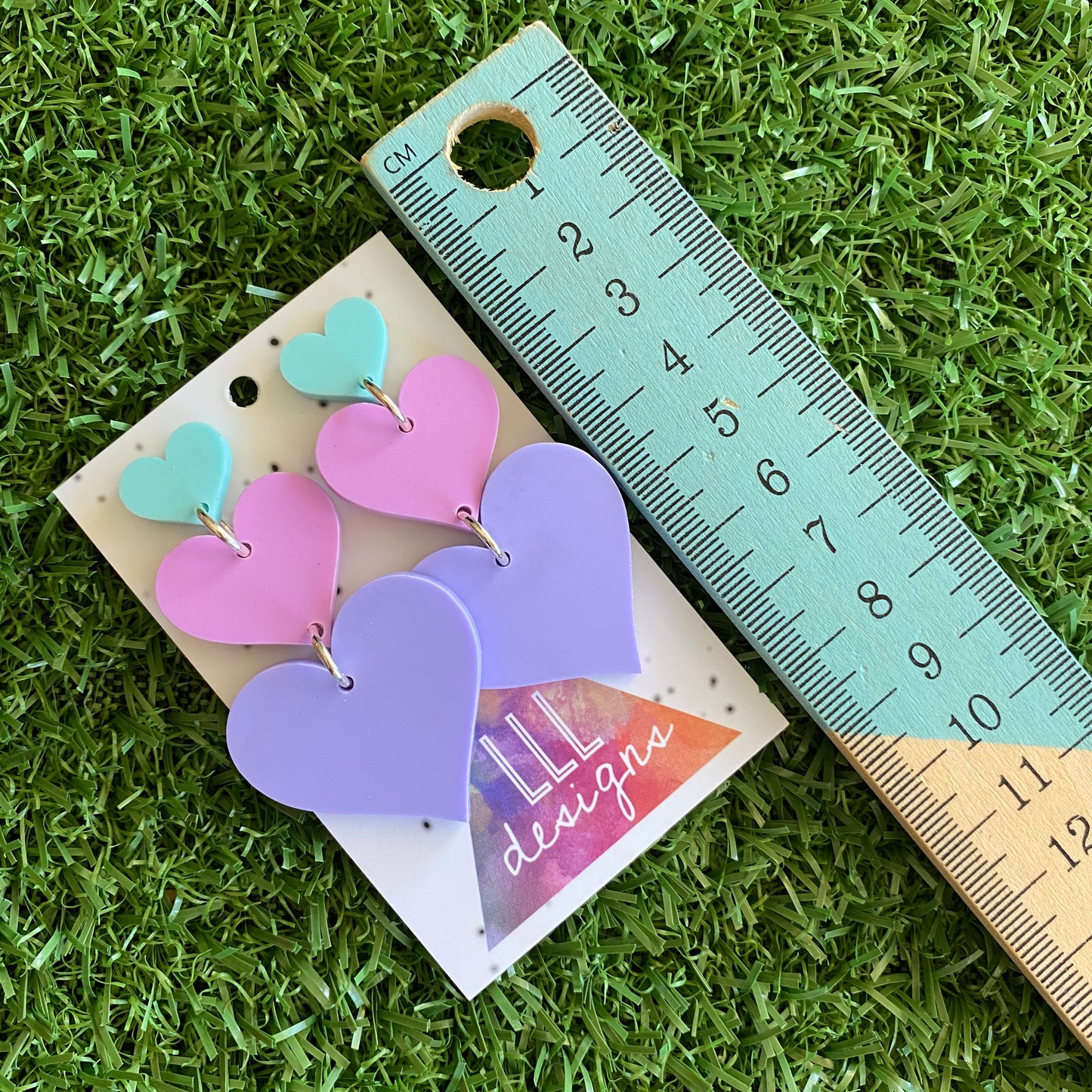 Pretty in Pastel Love Heart Trio Dangle Statement Earrings. These Babes are Perfection in Pastel! Featuring 3 Fabulous shades of Matte Pastel Acrylic.