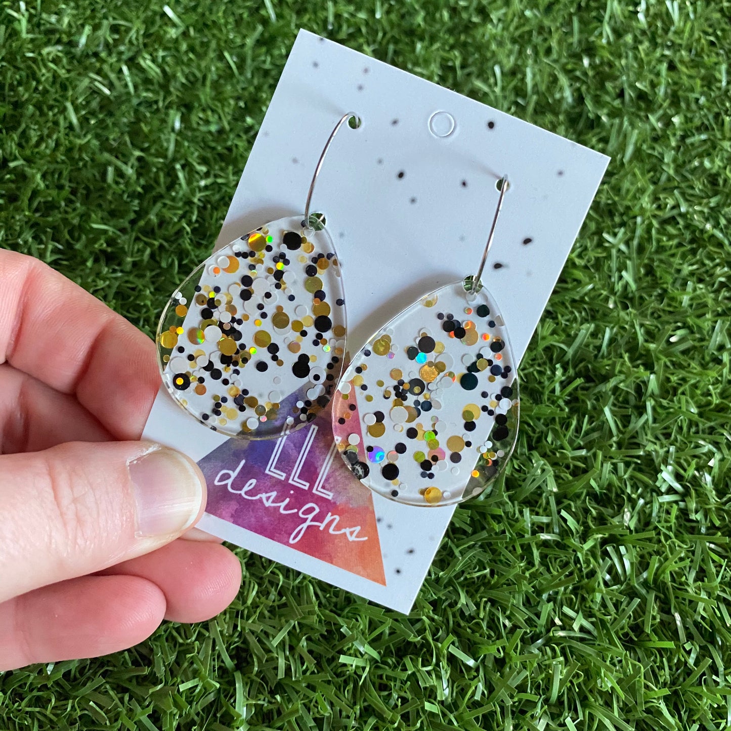 Stunning Clear Tear Drops featuring Polka Dot Confetti Scattered Throughout. Creating a beautiful visual effect. (Blk/White/Gold)