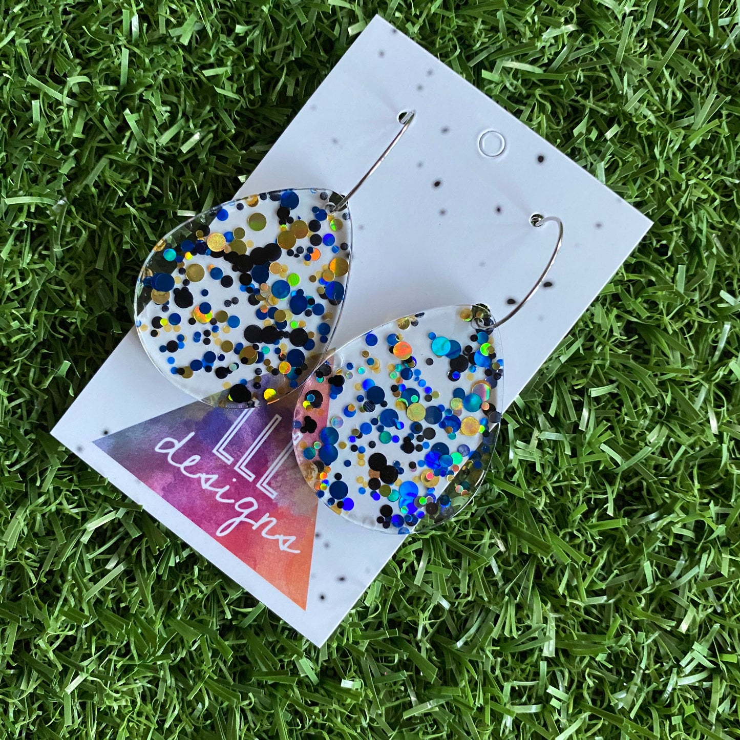 Stunning Clear Tear Drops featuring Polka Dot Confetti Scattered Throughout. Creating a beautiful visual effect. (Blue/Black/Gold).
