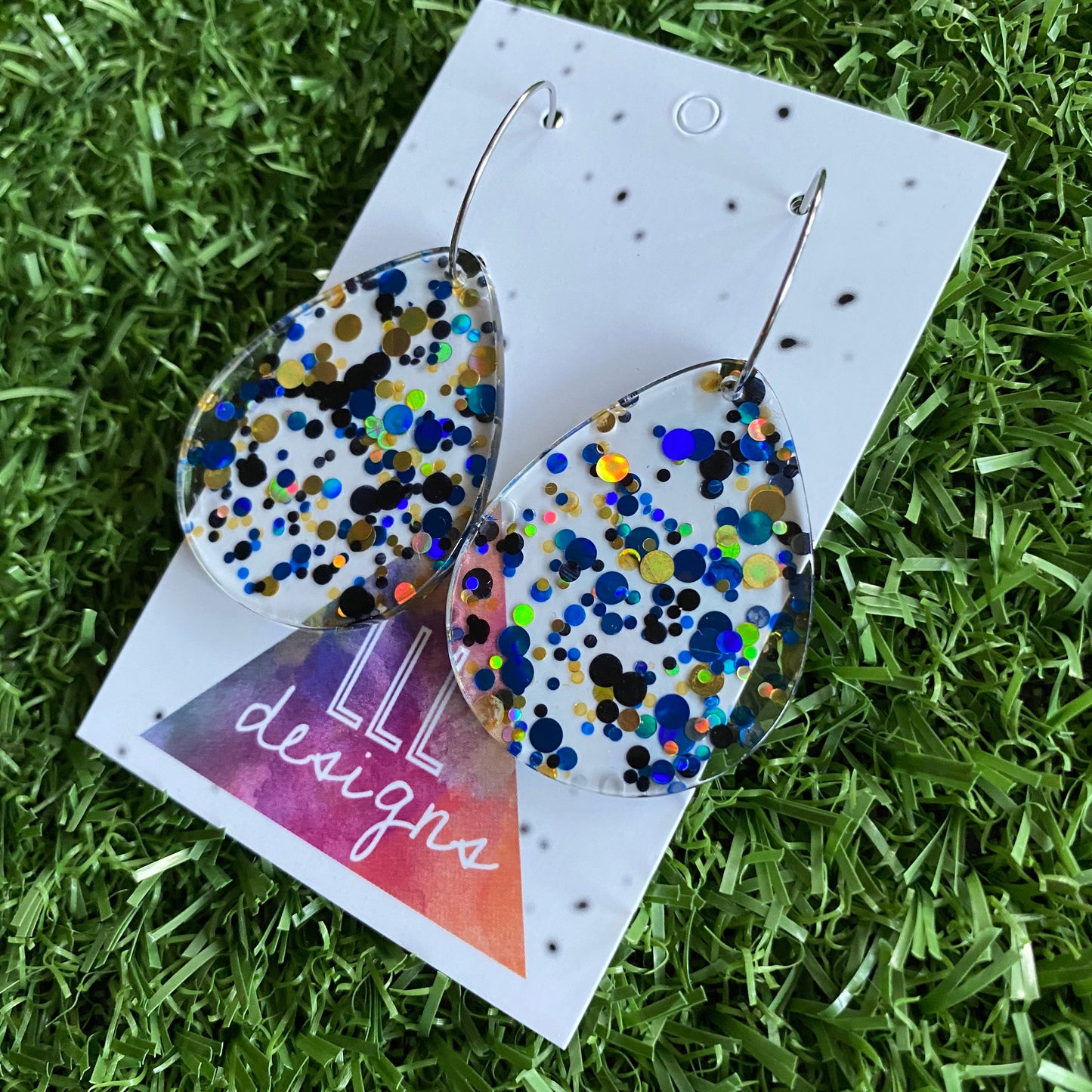 Stunning Clear Tear Drops featuring Polka Dot Confetti Scattered Throughout. Creating a beautiful visual effect. (Blue/Black/Gold).