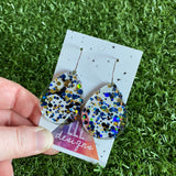 Stunning Clear Tear Drops featuring Polka Dot Confetti Scattered Throughout. Creating a beautiful visual effect. (Blue/Black/Gold).