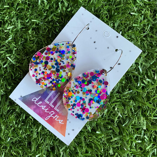 Stunning Clear Tear Drops featuring Polka Dot Confetti Scattered Throughout. Creating a beautiful visual effect. (Blue/Pink/Gold).