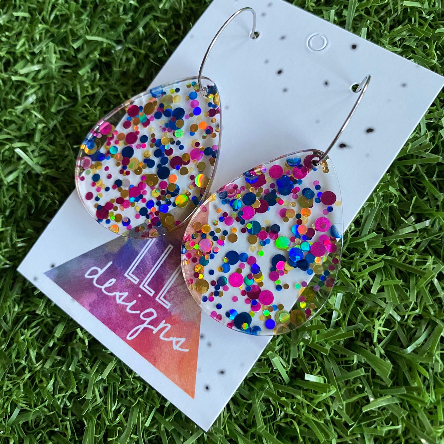 Stunning Clear Tear Drops featuring Polka Dot Confetti Scattered Throughout. Creating a beautiful visual effect. (Blue/Pink/Gold).