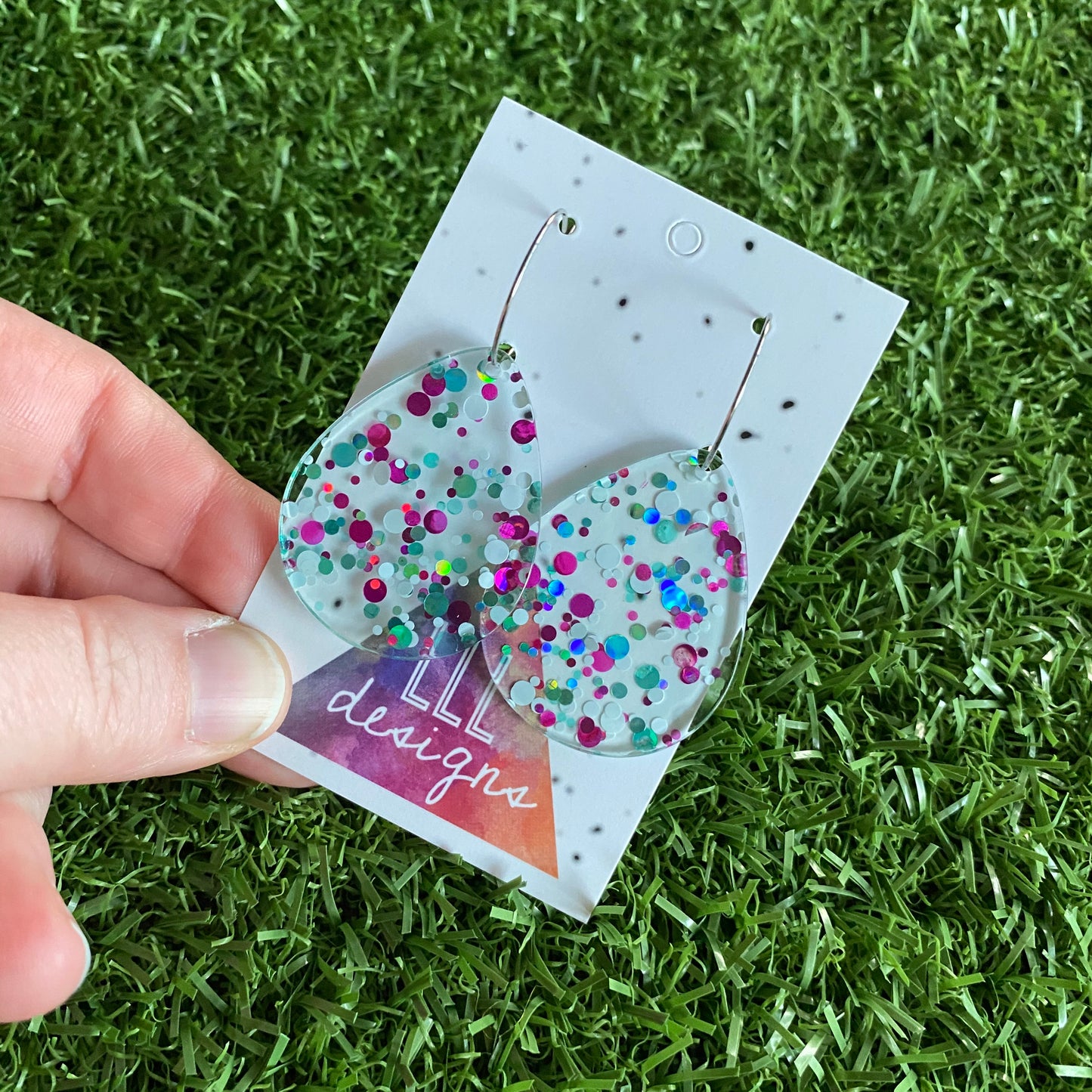 Stunning Clear Tear Drops featuring Polka Dot Confetti Scattered Throughout. Creating a beautiful visual effect. (White/Pink/Aqua).