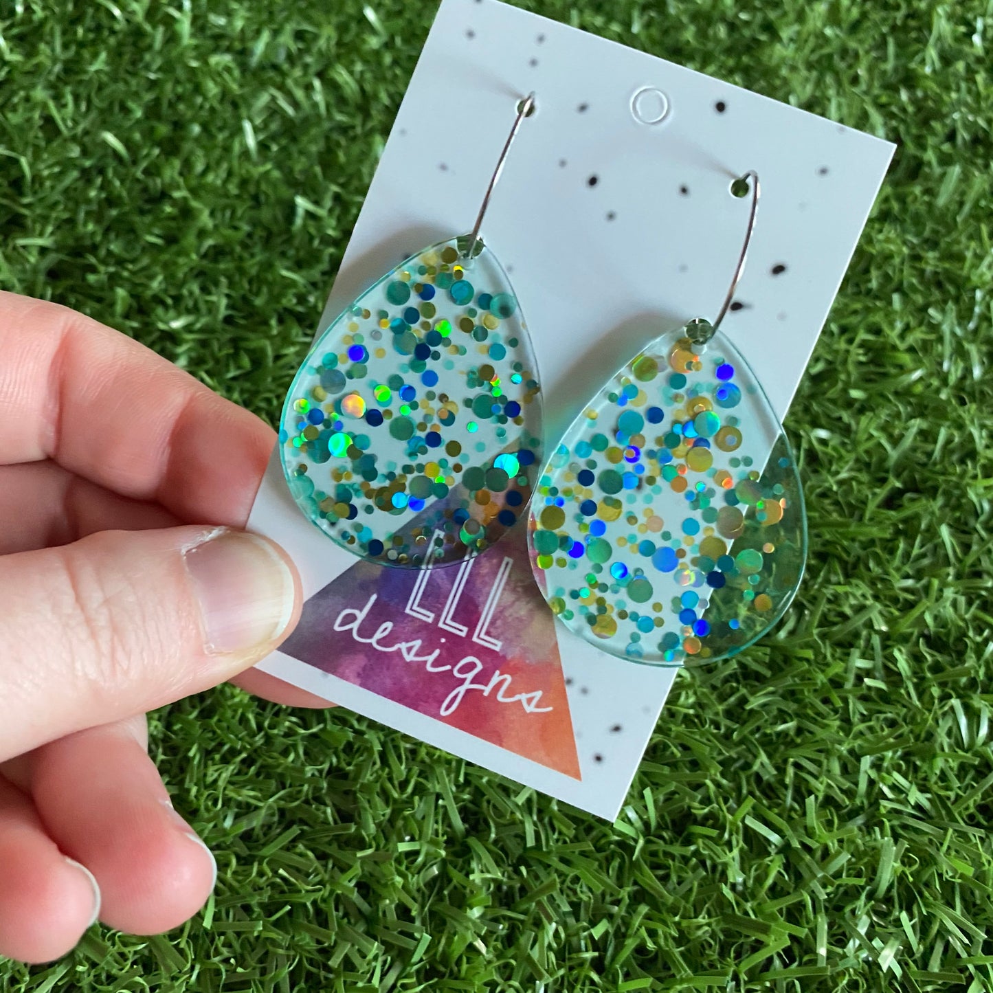 Stunning Clear Tear Drops featuring Polka Dot Confetti Scattered Throughout. Creating a beautiful visual effect. (Gold/Blue/Aqua).