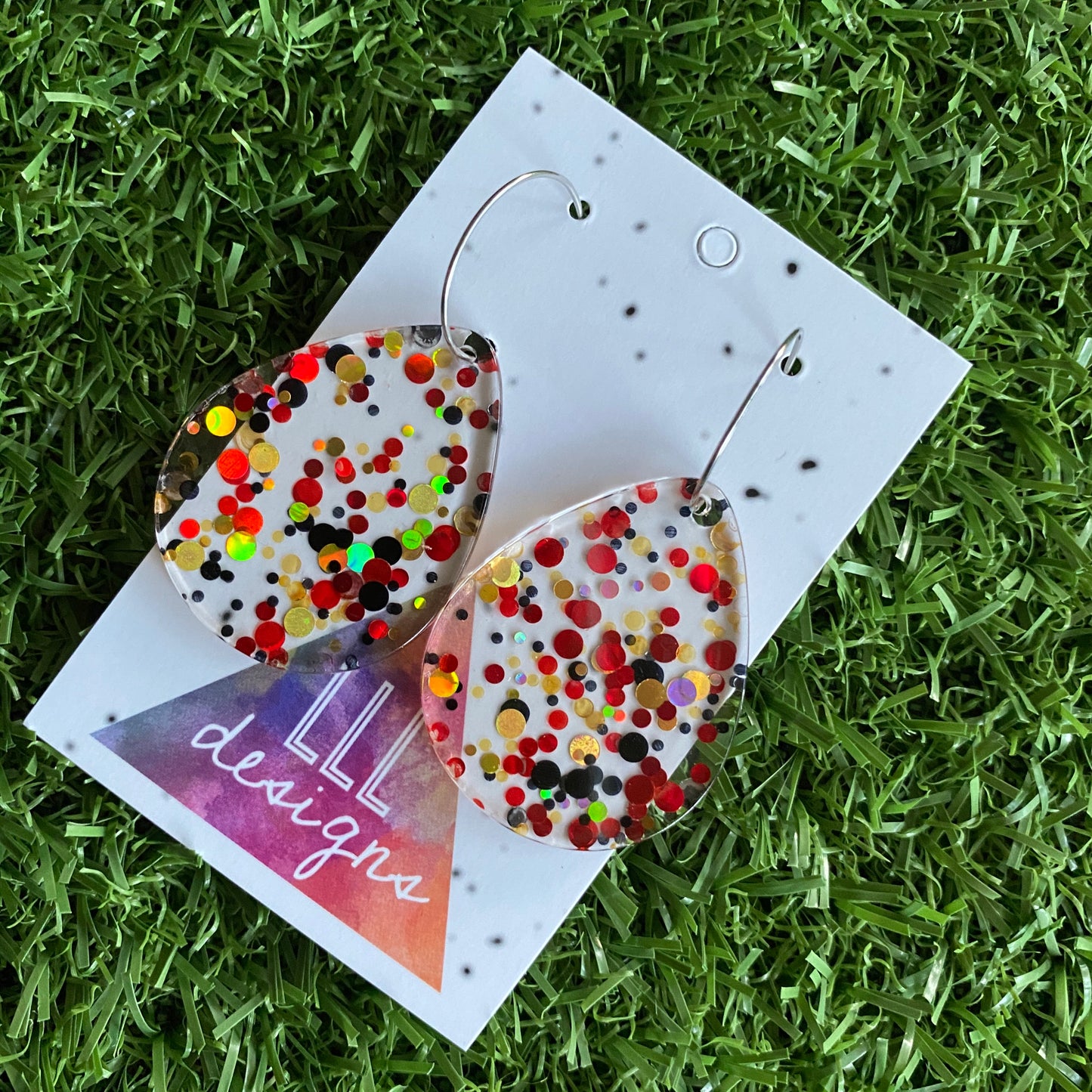 Stunning Clear Tear Drops featuring Polka Dot Confetti Scattered Throughout. Creating a beautiful visual effect. (Gold/Red/Black).