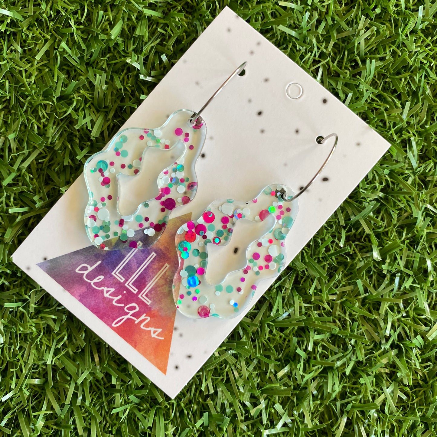 Stunning Clear Wiggle Jiggle Drops featuring Polka Dot Confetti Scattered Throughout. Creating a beautiful visual effect. (White/Aqua/Pink).