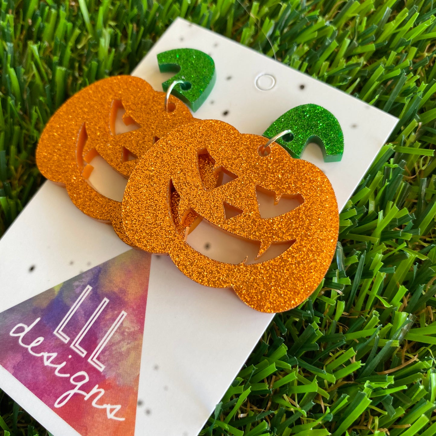 Pumpkin Earrings - Jack O Lantern Earrings - Glitter Orange Acrylic Jack O Lantern Dangles featuring Glitter Green Stem Tops. (Large)