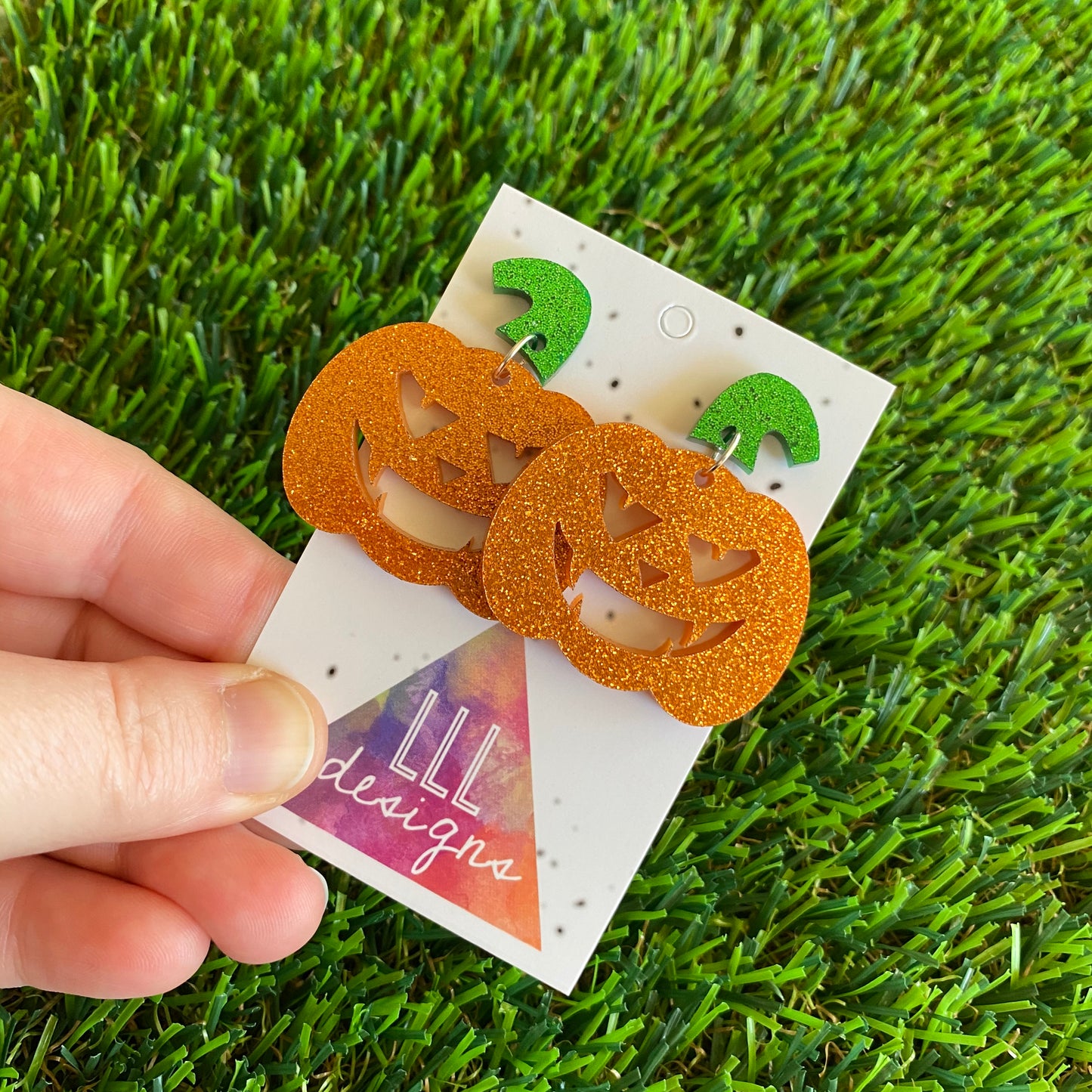 Pumpkin Earrings - Jack O Lantern Earrings - Glitter Orange Acrylic Jack O Lantern Dangles featuring Glitter Green Stem Tops. (Large)