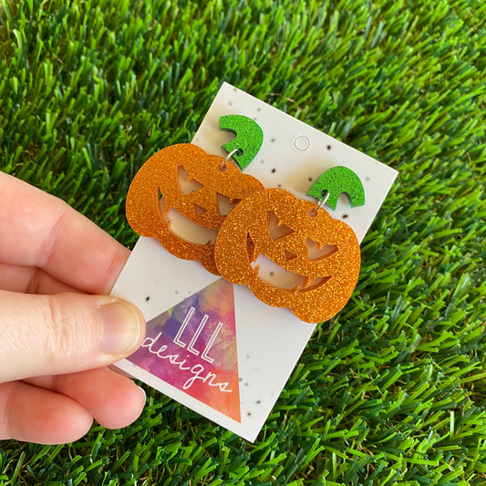 Pumpkin Earrings - Jack O Lantern Earrings - Glitter Orange Acrylic Jack O Lantern Dangles featuring Glitter Green Stem Tops. (Large)