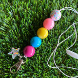 Rainbow Lanyard - Rainbow Delight Designer Lanyard. Fabulous Fun Colours that will Liven Up any outfit. Featuring an adorable Iridescent Star Charm.