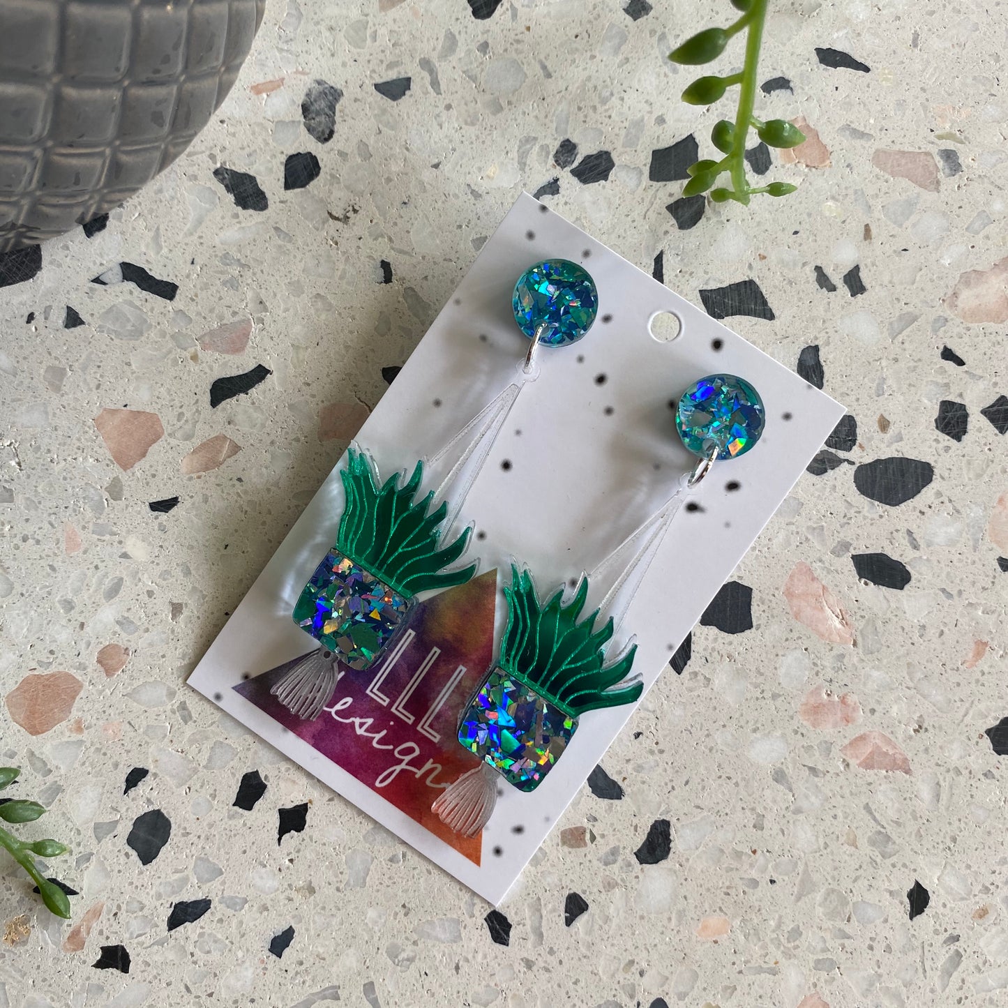 Hanging Planter Dangle Earrings. Featuring Stunning Blue and Silver Holographic Planters along with matching circular tops.