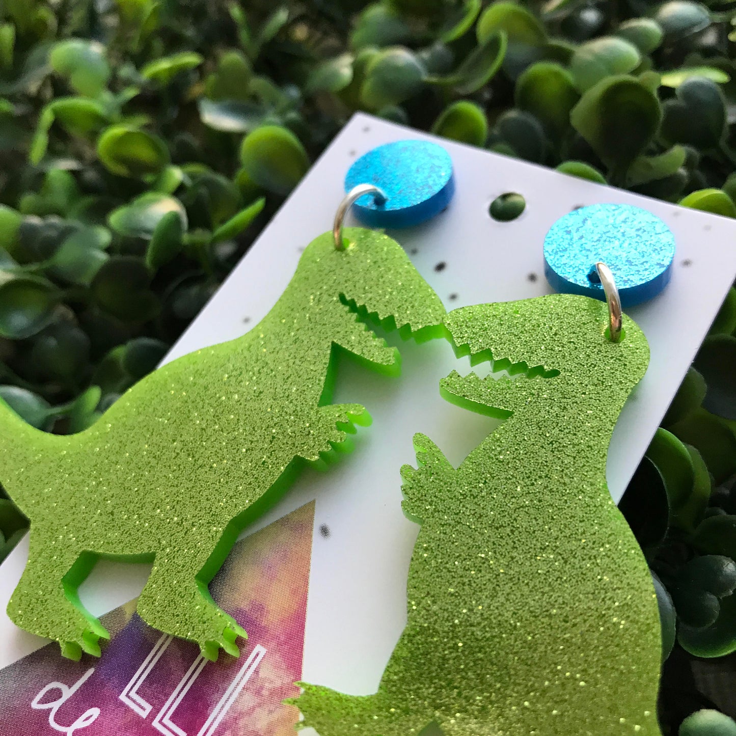Terrific Trex Statement Dangle Earrings. Jumbo Dino Dangles will always Brighten your day! Get your Groove on with this Glittery Guys!!