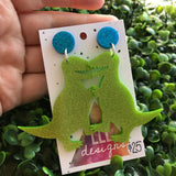 Terrific Trex Statement Dangle Earrings. Jumbo Dino Dangles will always Brighten your day! Get your Groove on with this Glittery Guys!!