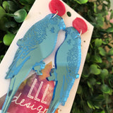 Mirror Budgie Statement Dangle Earrings. Baby Blue Laser Cut Mirrored Acrylic. Featuring Stunning Laser Etched Detail. Be BOLD Be YOU!!