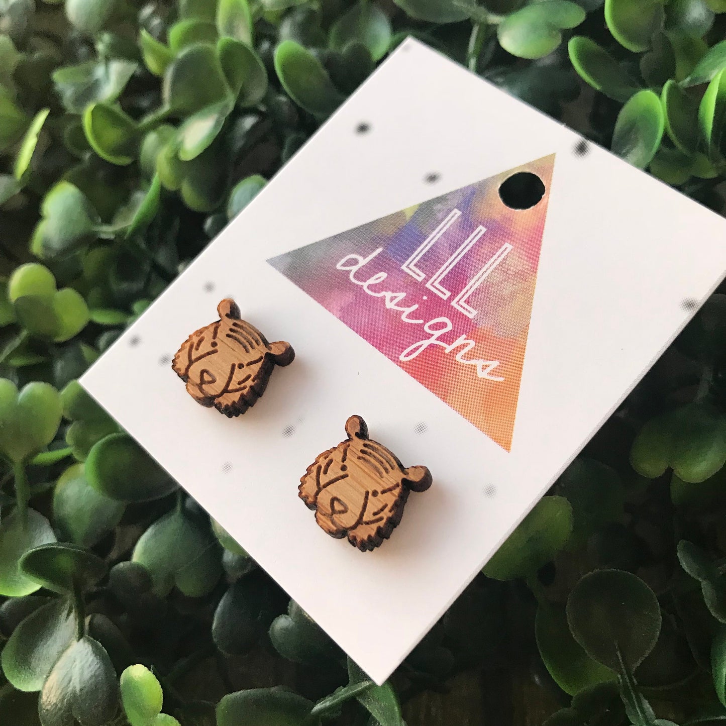 Terry The Tiger Etched Bamboo Stud Earrings. These detailed cuties will bring a smile to your face - along with all who see you wearing them