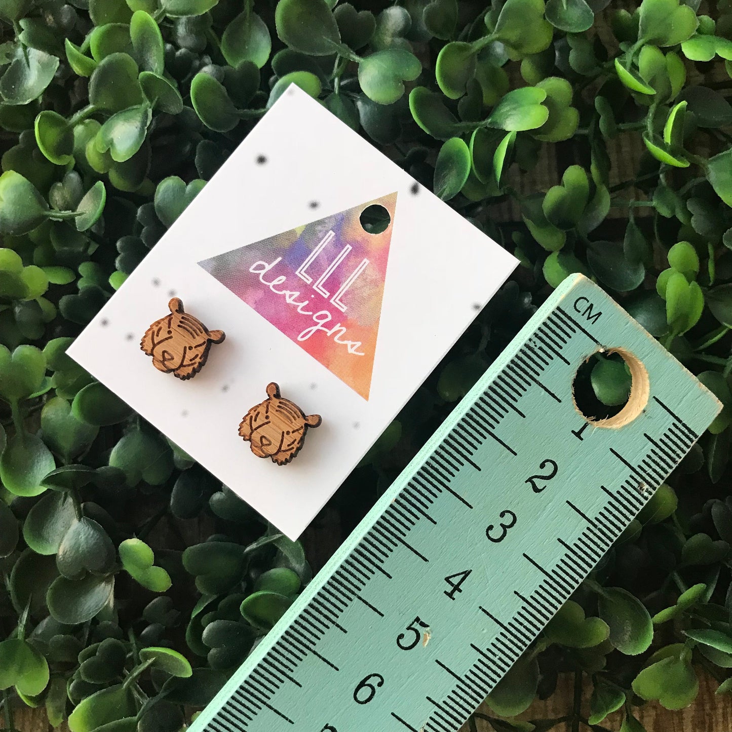 Terry The Tiger Etched Bamboo Stud Earrings. These detailed cuties will bring a smile to your face - along with all who see you wearing them